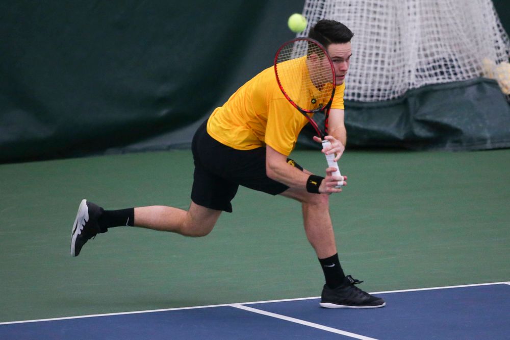 Iowa's Jonas Larsen at a tennis match vs Drake Friday, March 8, 2019 at the Hawkeye Tennis and Recreation Complex. (Lily Smith/hawkeyesports.com)