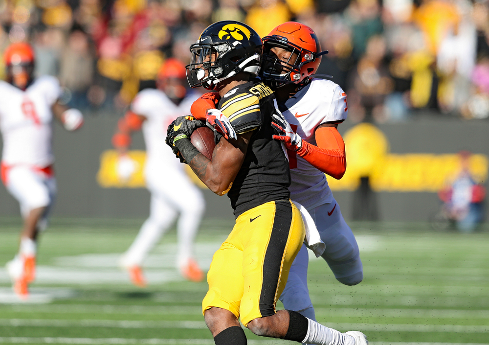 Iowa Hawkeyes wide receiver Ihmir Smith-Marsette (6) pulls in a pass during the third quarter of their game at Kinnick Stadium in Iowa City on Saturday, Nov 23, 2019. (Stephen Mally/hawkeyesports.com)