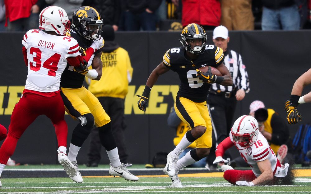 Iowa Hawkeyes wide receiver Ihmir Smith-Marsette (6) returns a kickoff during a game against Nebraska at Kinnick Stadium on November 23, 2018. (Tork Mason/hawkeyesports.com)