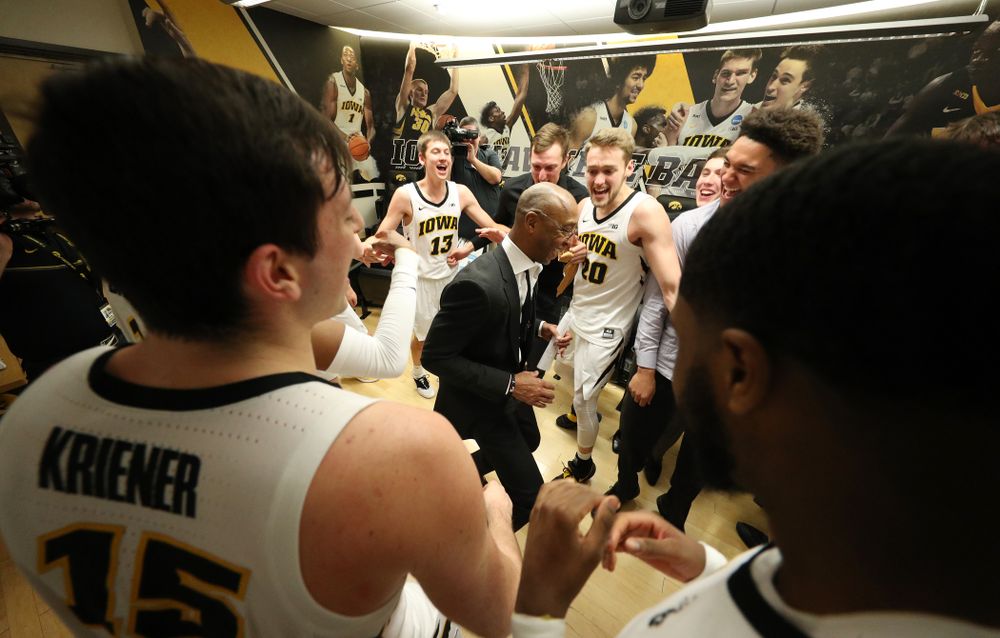 Iowa Hawkeyes assistant coach Sherman Dillard dances in the locker room following their victory over the Michigan Wolverines Friday, February 1, 2019 at Carver-Hawkeye Arena. (Brian Ray/hawkeyesports.com)