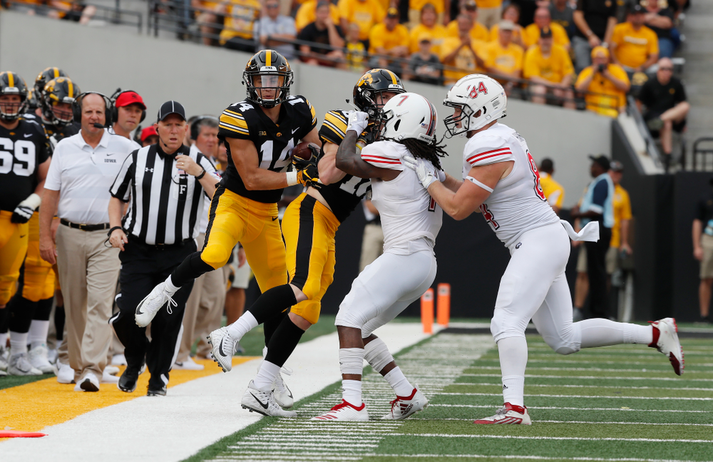 Iowa Hawkeyes wide receiver Kyle Groeneweg (14) returns a punt against the Northern Illinois Huskies Saturday, September 1, 2018 at Kinnick Stadium. (Brian Ray/hawkeyesports.com)