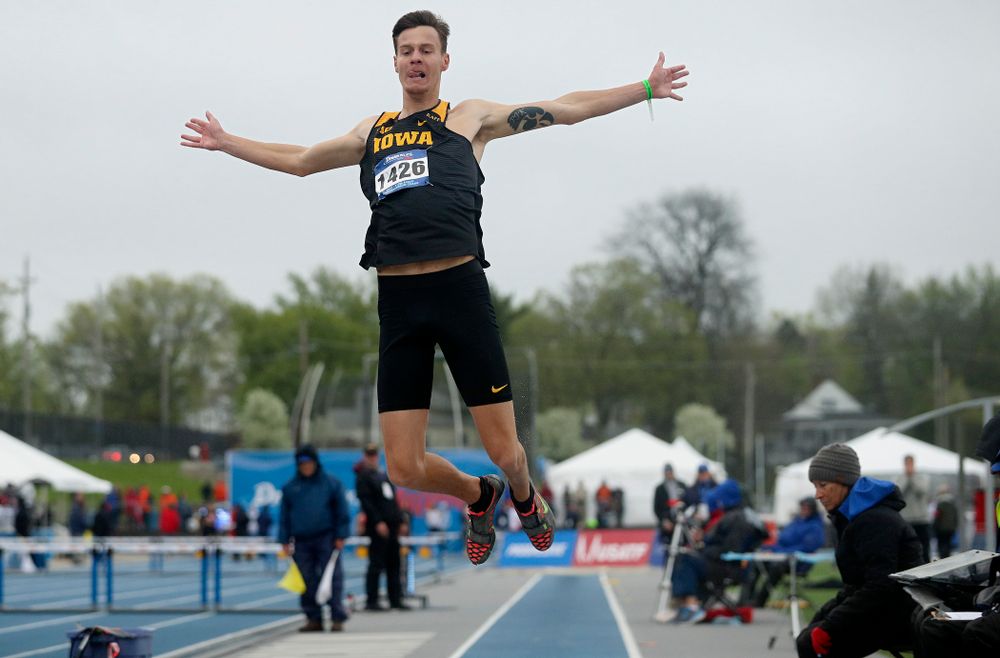 Iowa's Cooper Koenig jumps in the men's long jump event during the third day of the Drake Relays at Drake Stadium in Des Moines on Saturday, Apr. 27, 2019. (Stephen Mally/hawkeyesports.com)