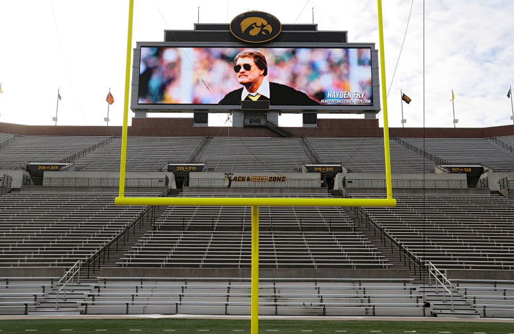 A picture of Hayden Fry is shown on the video boards at Kinnick Stadium in Iowa City on Wednesday, December 18, 2019. Hayden Fry passed away on Dec. 17, at the age of 90. (Stephen Mally/hawkeyesports.com)