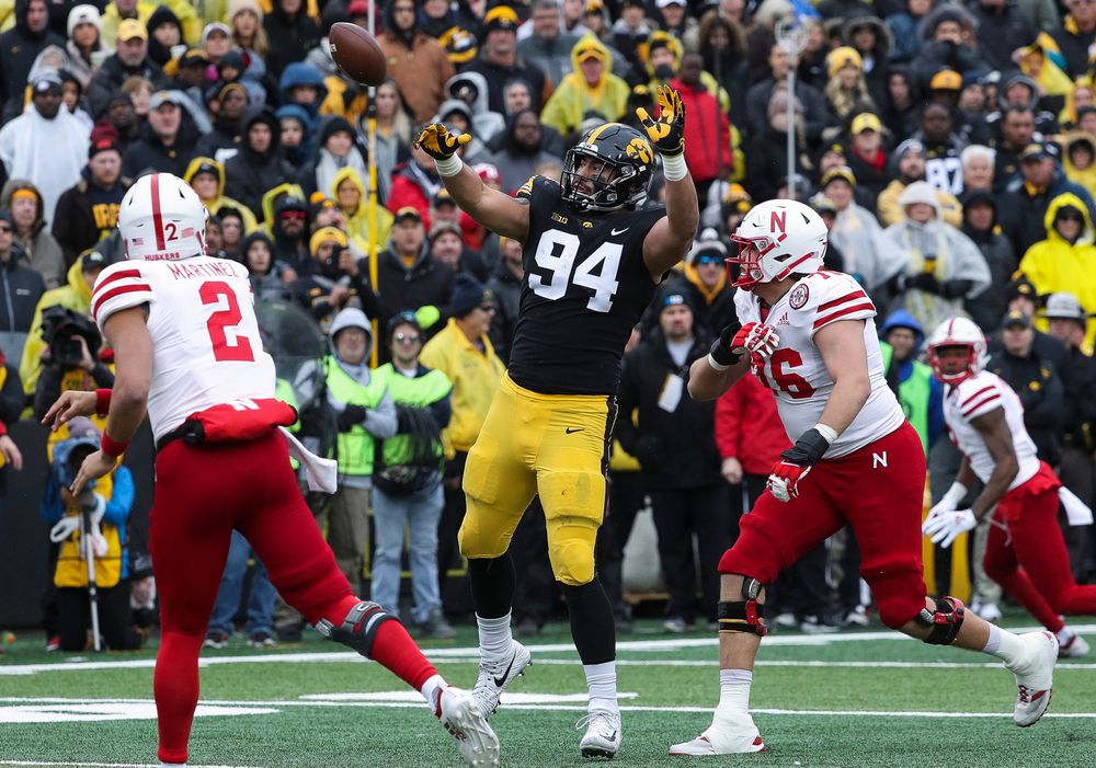 Iowa Hawkeyes defensive end A.J. Epenesa (94) bats down a pass during a game against Nebraska at Kinnick Stadium on November 23, 2018. (Tork Mason/hawkeyesports.com)