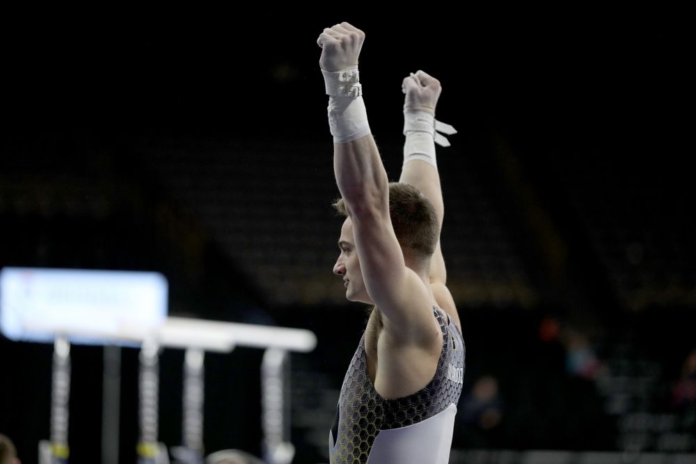 Iowa’s Mitch Mandozzi competes on the high bar against Illinois Sunday, March 1, 2020 at Carver-Hawkeye Arena. (Brian Ray/hawkeyesports.com)