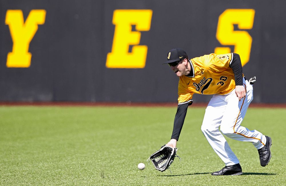 Iowa Hawkeyes Connor McCaffery (30) fields a ball during the sixth inning against Illinois at Duane Banks Field in Iowa City on Sunday, Mar. 31, 2019. (Stephen Mally/hawkeyesports.com)