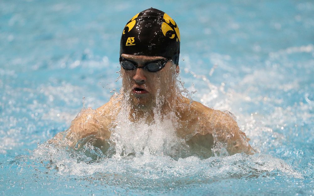 Iowa's Caleb Babb swims the breaststroke leg of the 200-yard medley relay during the third day of the Hawkeye Invitational at the Campus Recreation and Wellness Center on November 16, 2018. (Tork Mason/hawkeyesports.com)