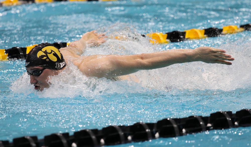 Michal Brzus competes in the 400-yard medley relay during a meet against Michigan and Denver at the Campus Recreation and Wellness Center on November 3, 2018. (Tork Mason/hawkeyesports.com)