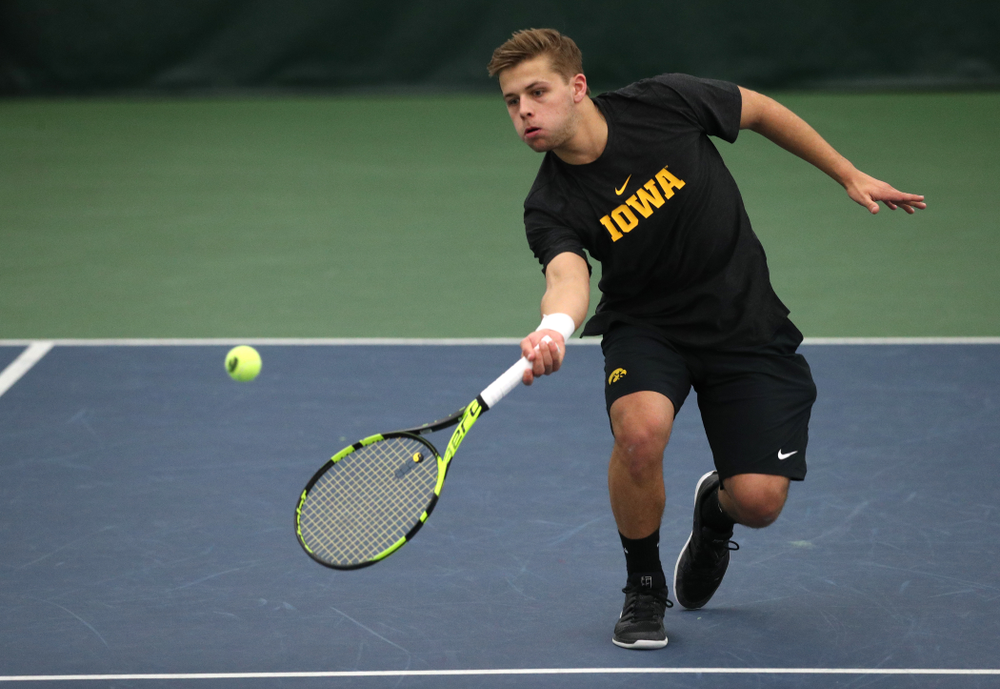 Will Davies and Oliver Okonkwo plays a doubles match against the Miami Hurricanes Friday, February 8, 2019 at the Hawkeye Tennis and Recreation Complex. (Brian Ray/hawkeyesports.com)