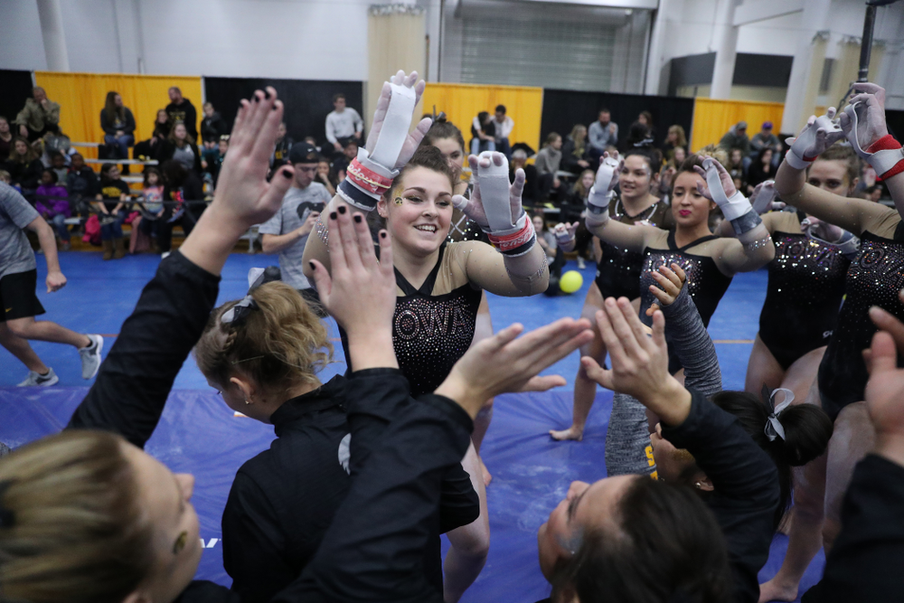 Erin Castle competes on the bars during the Black and Gold intrasquad meet Saturday, December 1, 2018 at the University of Iowa Field House. (Brian Ray/hawkeyesports.com)