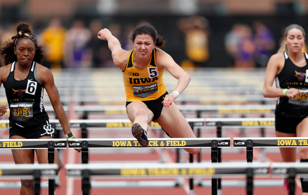 Iowa's Jenny Kimbro competes in the 100 meter hurdles during the 2018 MUSCO Twilight Invitational Thursday, April 12, 2018 at the Cretzmeye