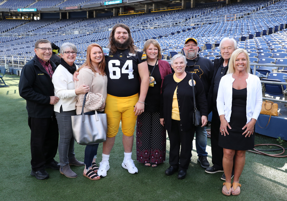Iowa Hawkeyes offensive lineman Kyler Schott (64) following the team photo Wednesday, December 25, 2019 at SDCCU Stadium in San Diego. (Brian Ray/hawkeyesports.com)