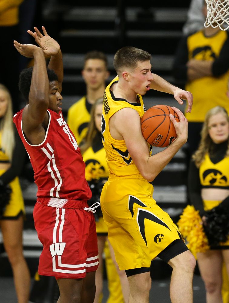 Iowa Hawkeyes guard Joe Wieskamp (10) grabs the rebound against Wisconsin on November 30, 2018 at Carver-Hawkeye Arena. (Tork Mason/hawkeyesports.com)