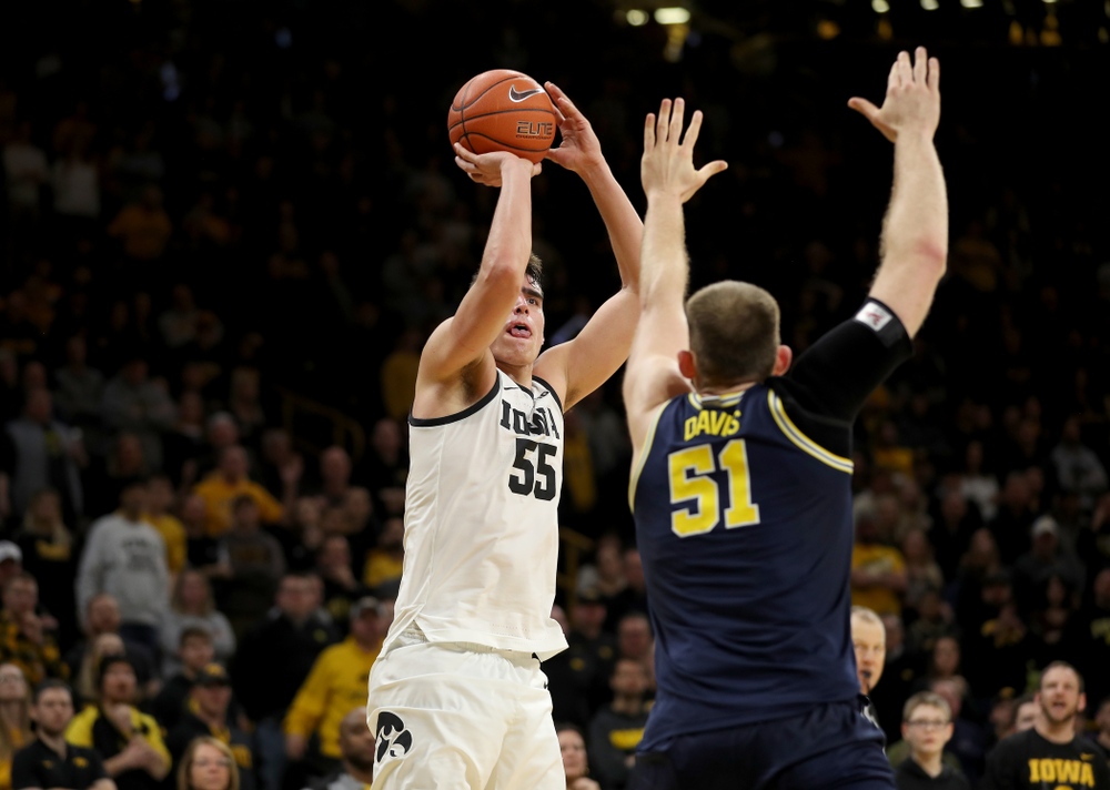 Iowa Hawkeyes forward Luka Garza (55) knocks down a shot against the Michigan Wolverines Friday, January 17, 2020 at Carver-Hawkeye Arena. (Brian Ray/hawkeyesports.com)
