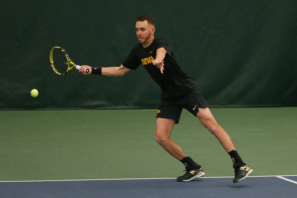 Iowa’s Kareem Allaf returns a ball during the Iowa men’s tennis meet vs VCU on Saturday, February 29, 2020 at the Hawkeye Tennis and Recreation Complex. (Lily Smith/hawkeyesports.com)