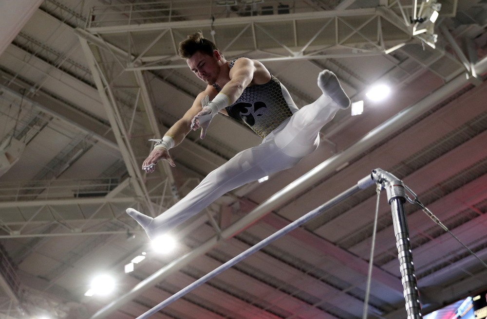 Iowa’s Alex Walther competes on the high bar against UIC and Minnesota Saturday, February 1, 2020 at Carver-Hawkeye Arena. (Brian Ray/hawkeyesports.com)