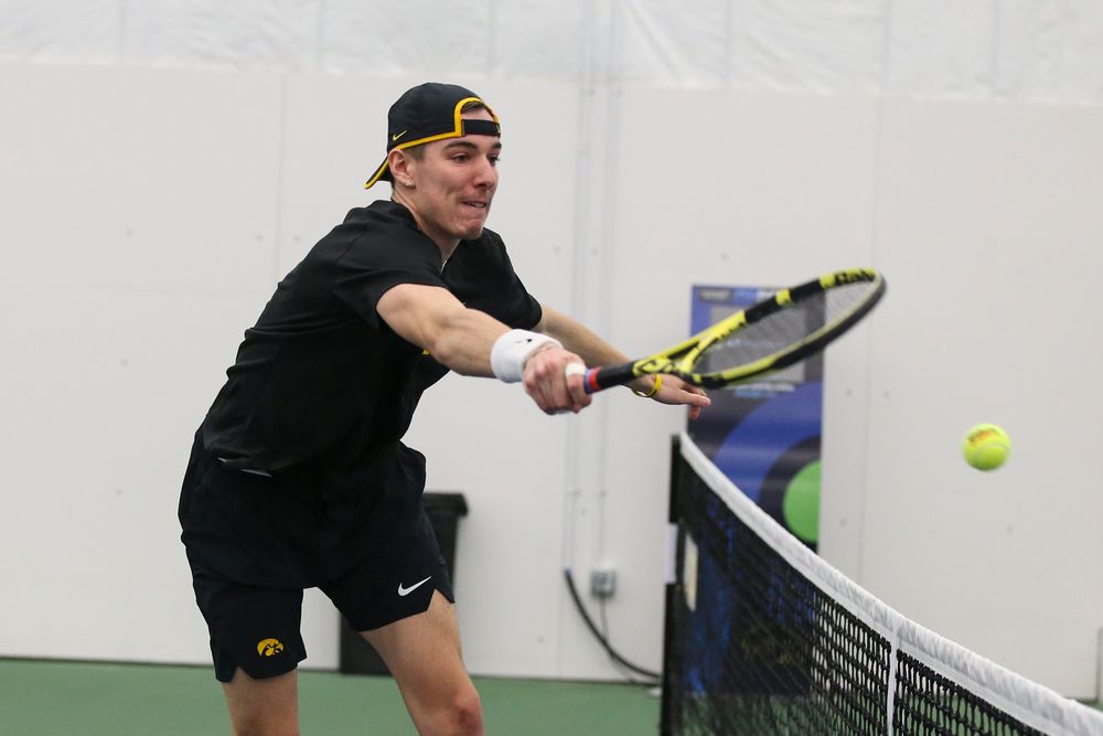 during the Iowa men’s tennis meet vs VCU on Saturday, February 29, 2020 at the Hawkeye Tennis and Recreation Complex. (Lily Smith/hawkeyesports.com)