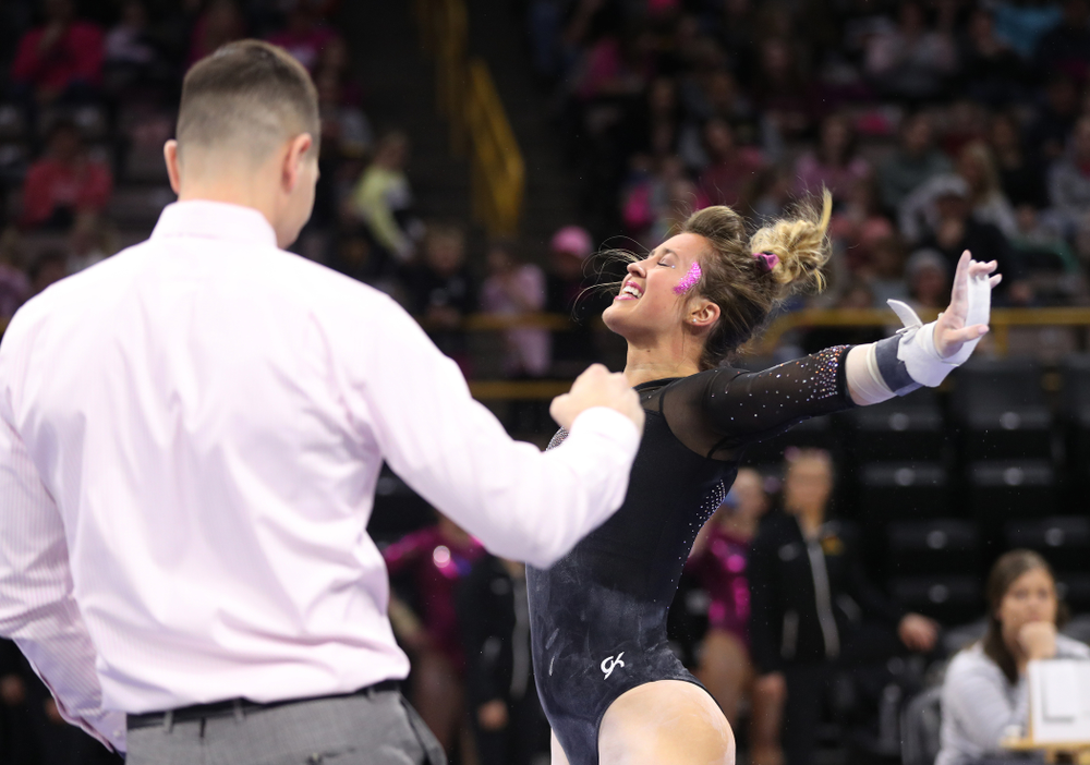 Iowa's Maddie Kampschroeder competes on the bars during their meet against the Minnesota Golden Gophers Saturday, January 19, 2019 at Carver-Hawkeye Arena. (Brian Ray/hawkeyesports.com)