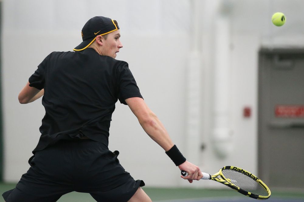 Iowa’s Joe Tyler returns a hit during the Iowa men’s tennis meet vs VCU on Saturday, February 29, 2020 at the Hawkeye Tennis and Recreation Complex. (Lily Smith/hawkeyesports.com)