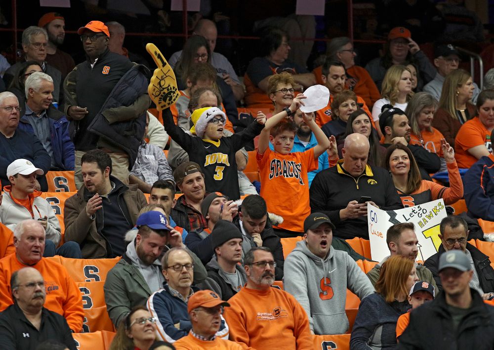 A young Hawkeye fan cheers during the first half of Iowa’s ACC/Big Ten Challenge game at the Carrier Dome in Syracuse, N.Y. on Tuesday, Dec 3, 2019. (Stephen Mally/hawkeyesports.com)