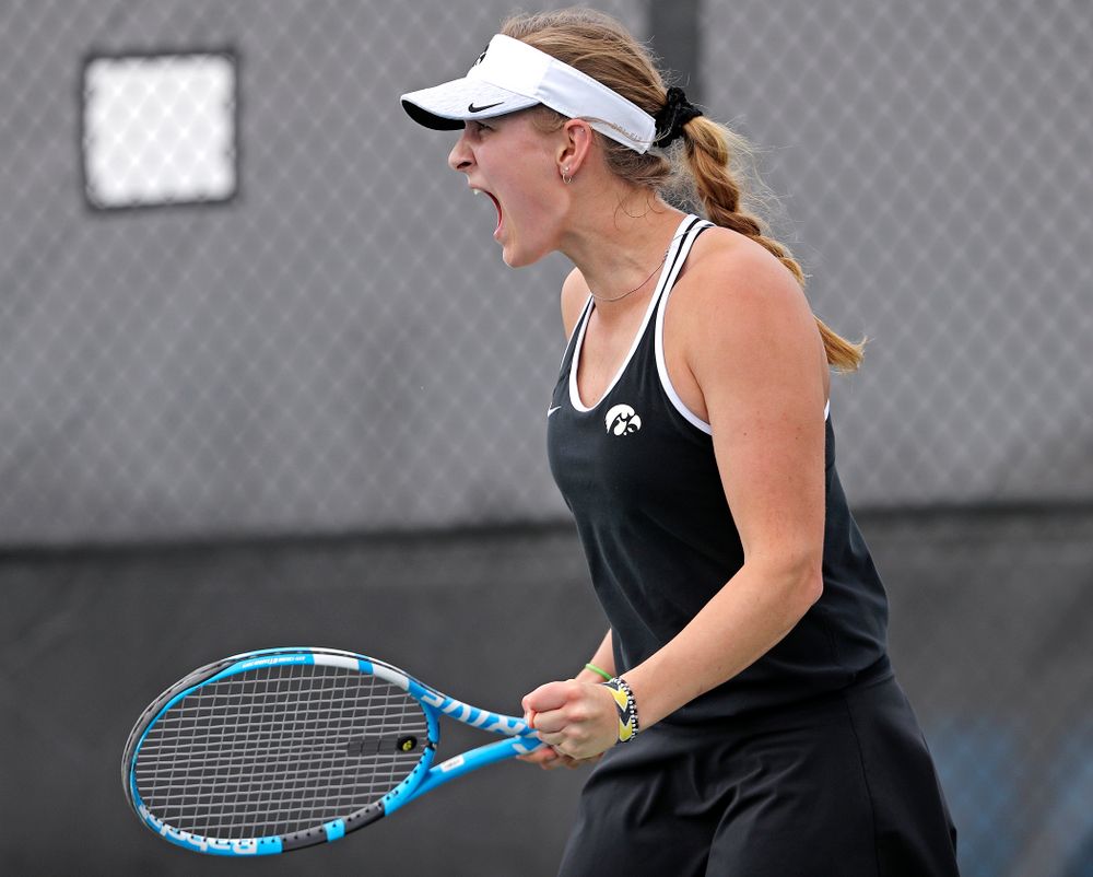 Iowa's Ashleigh Jacobs celebrates after winning her match against Rutgers at the Hawkeye Tennis and Recreation Complex in Iowa City on Friday, Apr. 5, 2019. (Stephen Mally/hawkeyesports.com)