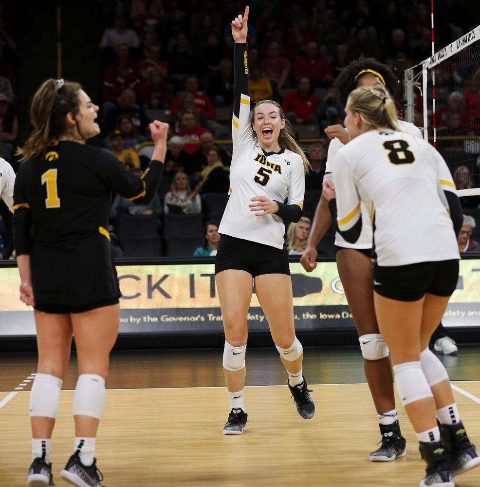Iowa Hawkeyes outside hitter Meghan Buzzerio (5) celebrates after winning a point during a match against Nebraska at Carver-Hawkeye Arena on November 7, 2018. (Tork Mason/hawkeyesports.com)