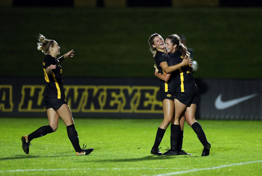 Iowa Hawkeyes forward Gianna Gourley (32) celebrates with midfielder Josie Durr (25) after scoring against the Nebraska Cornhuskers Thursday, October 3, 2019 at the Iowa Soccer Complex. (Brian Ray/hawkeyesports.com)