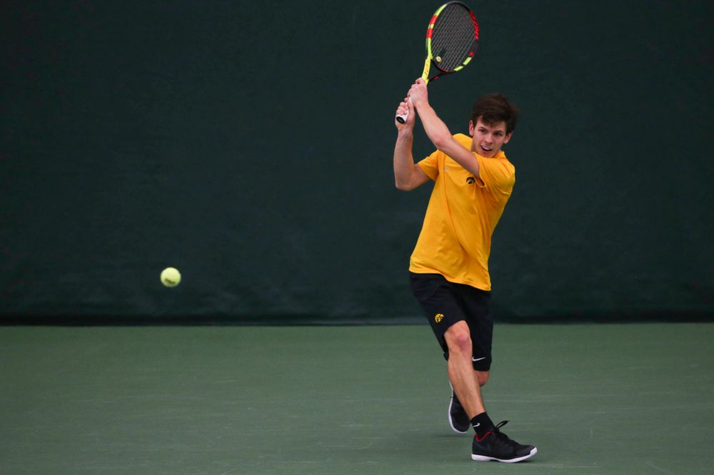 Iowa's Joe Tyler at a tennis match vs Drake Friday, March 8, 2019 at the Hawkeye Tennis and Recreation Complex. (Lily Smith/hawkeyesports.com)