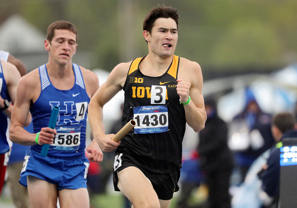 Iowa's Carter Lilly runs the men's sprint medley relay event during the third day of the Drake Relays at Drake Stadium in Des Moines on Saturday, Apr. 27, 2019. (Stephen Mally/hawkeyesports.com)