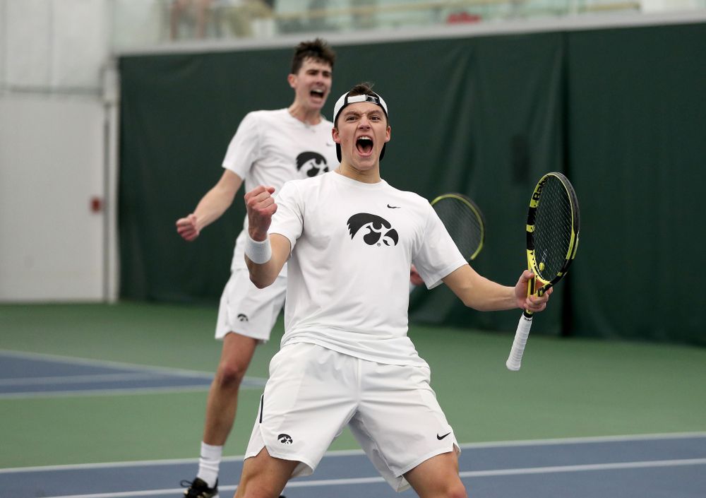 Iowa’s Joe Tyler and Matt Cleggle celebrating after winning a doubles match against Cornell Sunday, March 8, 2020 at the Hawkeye Tennis and Recreation Center. (Brian Ray/hawkeyesports.com)