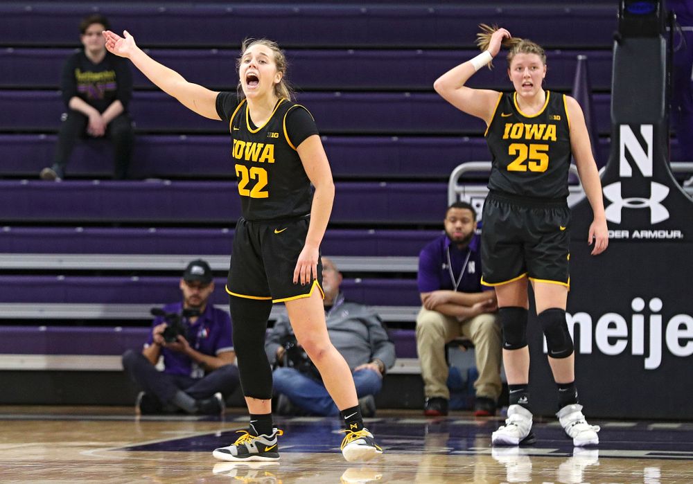 Iowa Hawkeyes guard Kathleen Doyle (22) pumps up the crowd during the first quarter of their game at Welsh-Ryan Arena in Evanston, Ill. on Sunday, January 5, 2020. (Stephen Mally/hawkeyesports.com)