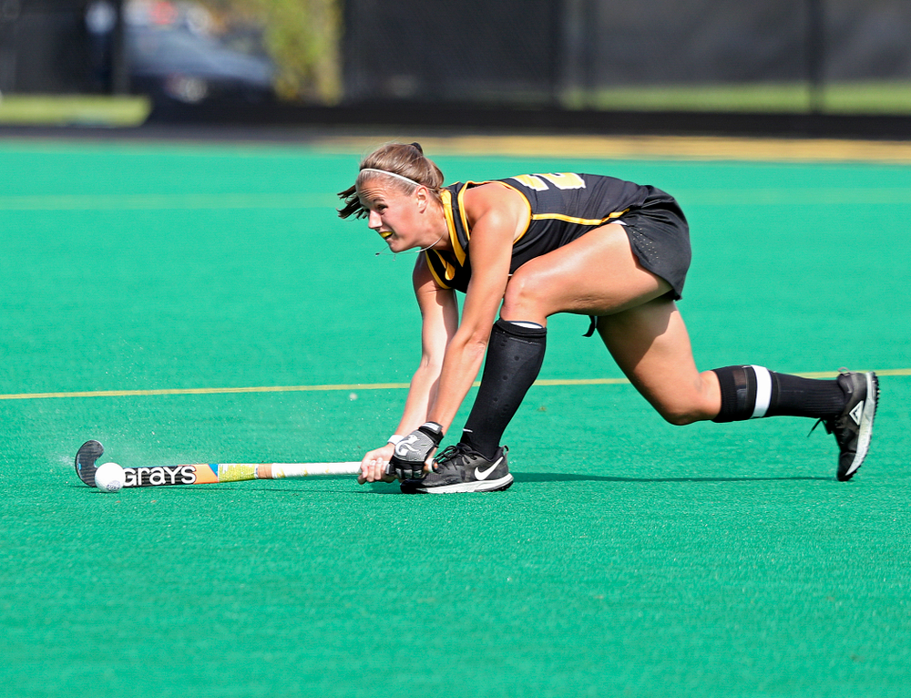 Iowa’s Sophie Sunderland (20) passes during the first quarter of their match at Grant Field in Iowa City on Friday, Oct 4, 2019. (Stephen Mally/hawkeyesports.com)
