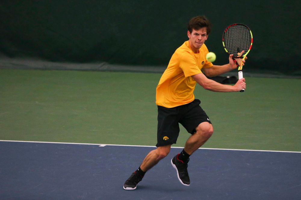 Iowa's Joe Tyler at a tennis match vs Drake Friday, March 8, 2019 at the Hawkeye Tennis and Recreation Complex. (Lily Smith/hawkeyesports.com)