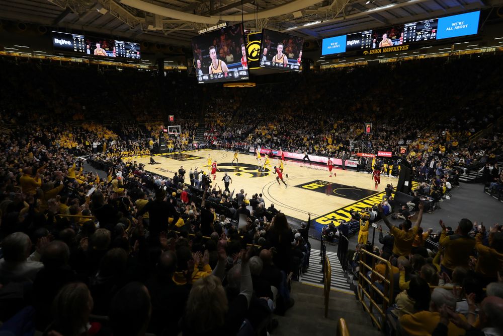 Fans celebrate a three point basket by Iowa Hawkeyes guard Joe Wieskamp (10) against the Nebraska Cornhuskers Saturday, February 8, 2020 at Carver-Hawkeye Arena. (Brian Ray/hawkeyesports.com)