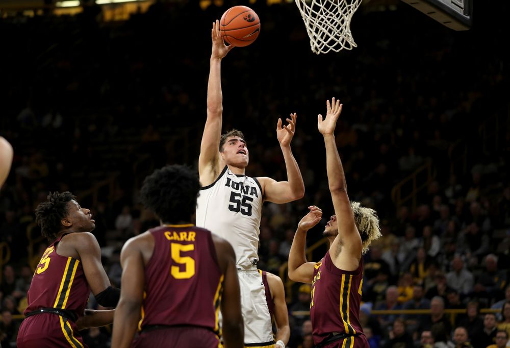 Iowa Hawkeyes forward Luka Garza (55) goes to the hoop against the Minnesota Golden Gophers Monday, December 9, 2019 at Carver-Hawkeye Arena. (Brian Ray/hawkeyesports.com)
