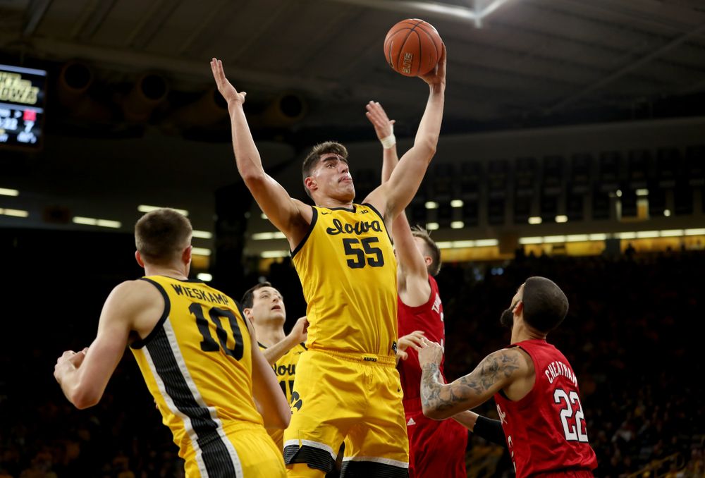 Iowa Hawkeyes forward Luka Garza (55) grabs a rebound against the Nebraska Cornhuskers Saturday, February 8, 2020 at Carver-Hawkeye Arena. (Brian Ray/hawkeyesports.com)