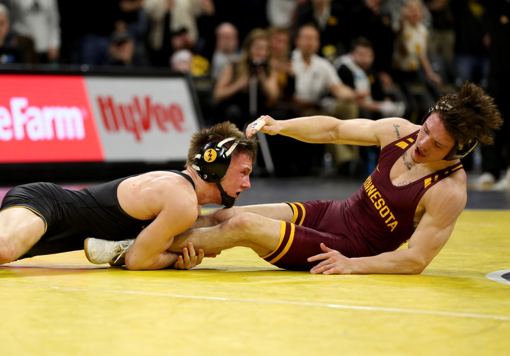 Iowa’s Max Murin wrestles Minnesota’s Mitch McKee at 141 pounds Saturday, February 15, 2020 at Carver-Hawkeye Arena. Murin won the match 6-4. (Brian Ray/hawkeyesports.com)