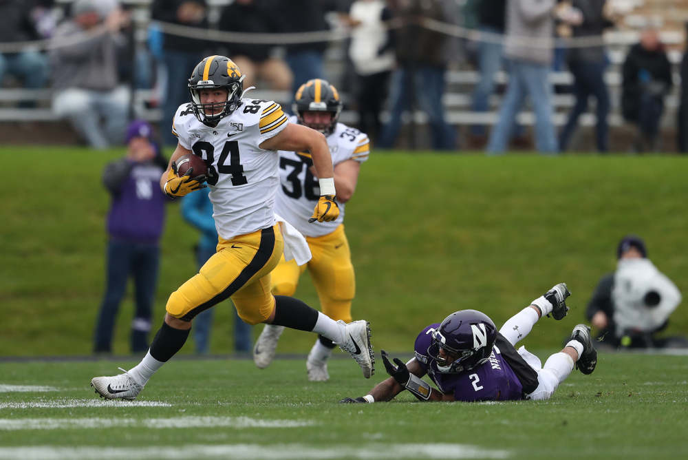 Iowa Hawkeyes tight end Sam LaPorta (84) makes a catch for a first down against the Northwestern Wildcats Saturday, October 26, 2019 at Ryan Field in Evanston, Ill. (Brian Ray/hawkeyesports.com)
