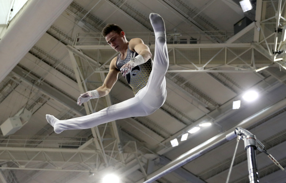Iowa’s Mitch Mandozzi competes on the high bar against UIC and Minnesota Saturday, February 1, 2020 at Carver-Hawkeye Arena. (Brian Ray/hawkeyesports.com)