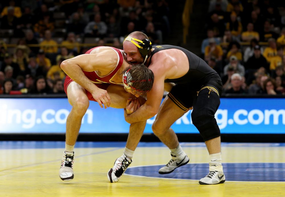 IowaÕs Alex Marinelli wrestles WisconsinÕs Evan Wick at 165 pounds Sunday, December 1, 2019 at Carver-Hawkeye Arena. Marinelli won the match 4-2. (Brian Ray/hawkeyesports.com)
