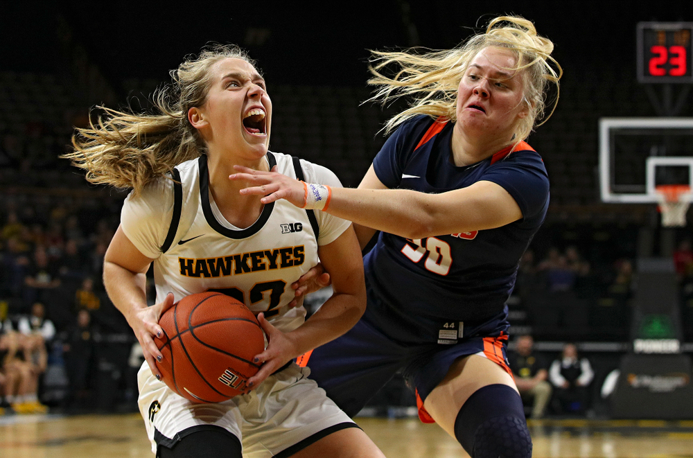Iowa Hawkeyes guard Kathleen Doyle (22) drives to the basket during the second quarter of their game at Carver-Hawkeye Arena in Iowa City on Tuesday, December 31, 2019. (Stephen Mally/hawkeyesports.com)