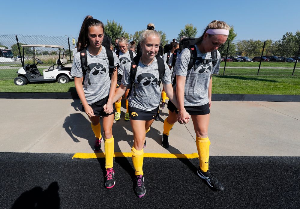The Seniors cross the line before their game against Indiana Sunday, September 16, 2018 at Grant Field. (Brian Ray/hawkeyesports.com)