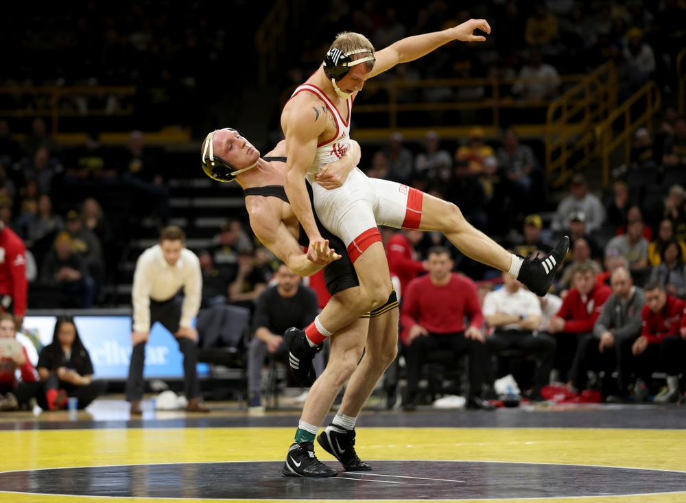 Iowa’s Kaleb Young wrestles Nebraska’s Peyton Rob at 157 pounds Saturday, January 18, 2020 at Carver-Hawkeye Arena. Young won the match 6-4. (Brian Ray/hawkeyesports.com)