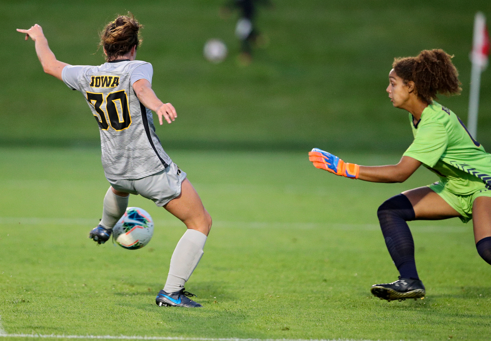 Iowa forward Devin Burns (30) scores a goal during the first half of their match at the Iowa Soccer Complex in Iowa City on Friday, Sep 13, 2019. (Stephen Mally/hawkeyesports.com)