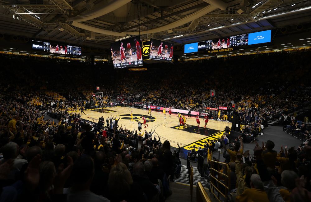 Fans celebrate a three point basket against the Nebraska Cornhuskers Saturday, February 8, 2020 at Carver-Hawkeye Arena. (Brian Ray/hawkeyesports.com)