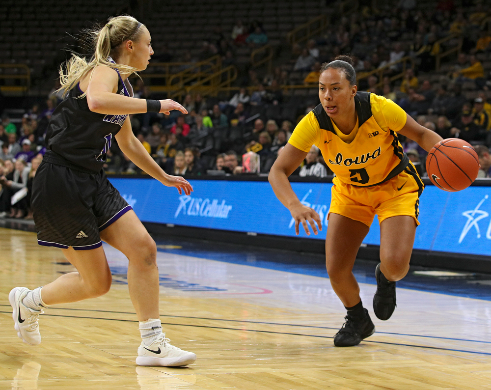 Iowa guard Alexis Sevillian (5) drives with the ball during the third quarter of their game against Winona State at Carver-Hawkeye Arena in Iowa City on Sunday, Nov 3, 2019. (Stephen Mally/hawkeyesports.com)
