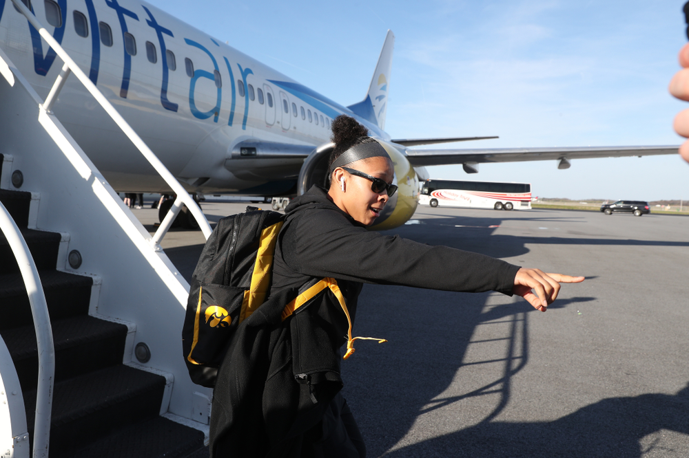 Iowa Hawkeyes guard Tania Davis (11) arrives in Greensboro, NC for the Regionals of the 2019 NCAA Women's Basketball Championships Thursday, March 28, 2019 at the Eastern Iowa Airport. (Brian Ray/hawkeyesports.com)