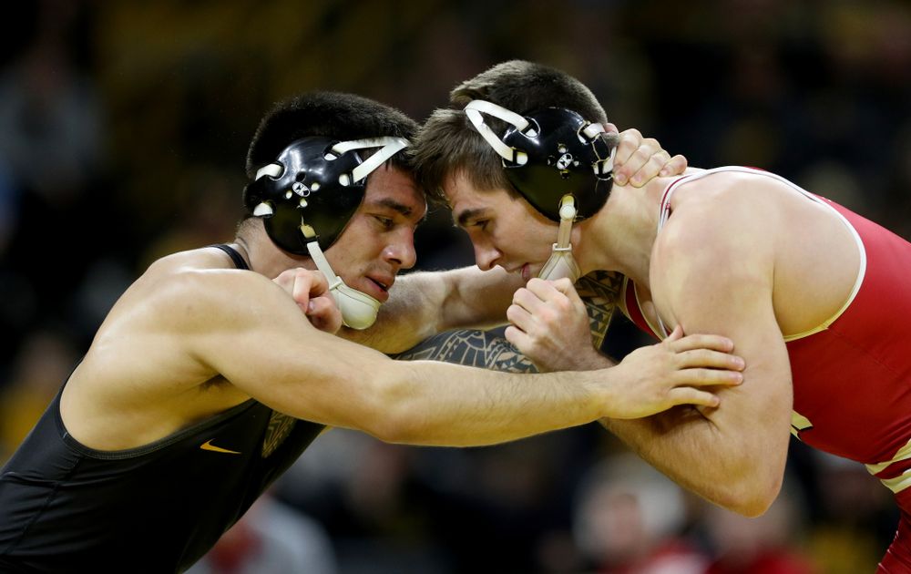 IowaÕs Pat Lugo wrestles WisconsinÕs Cole Martin at 149 pounds Sunday, December 1, 2019 at Carver-Hawkeye Arena. Lugo won the match 5-3. (Brian Ray/hawkeyesports.com)