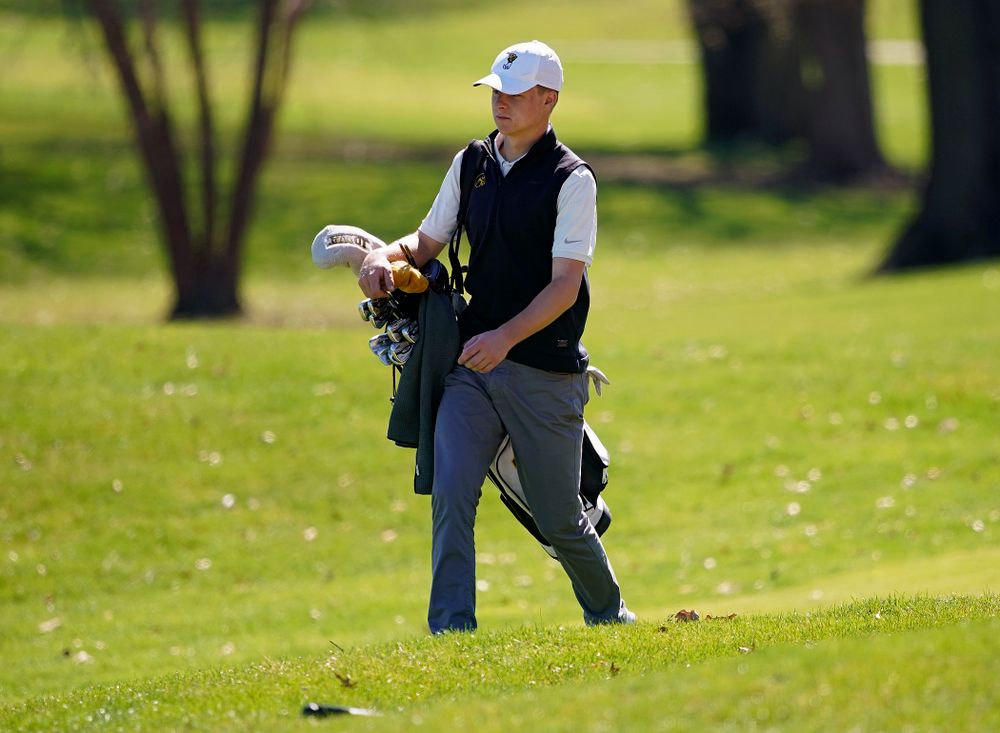 Iowa's Benton Weinberg walks between holes during the first round of the Hawkeye Invitational at Finkbine Golf Course in Iowa City on Saturday, Apr. 20, 2019. (Stephen Mally/hawkeyesports.com)