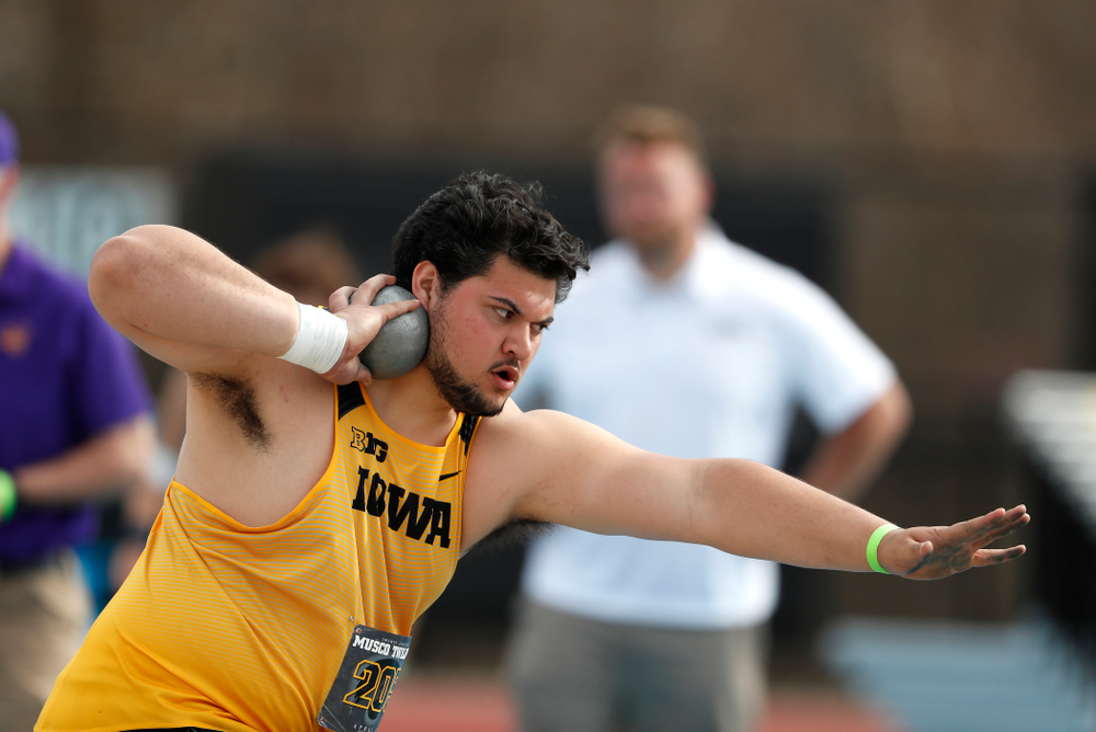 Iowa's Iowa's Reno Tuufuli competes in the shot put during the 2018 MUSCO Twilight Invitational Thursday, April 12, 2018 at the Cretzmeyer